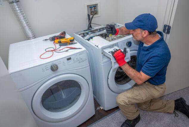kitchen appliance being repaired by skilled technician in Arcadia FL