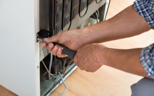 warning signs such as a warm refrigerator or excessive frost buildup may indicate the need for refrigerator repair